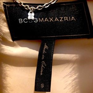 Fur coat worn one time excellent condition.